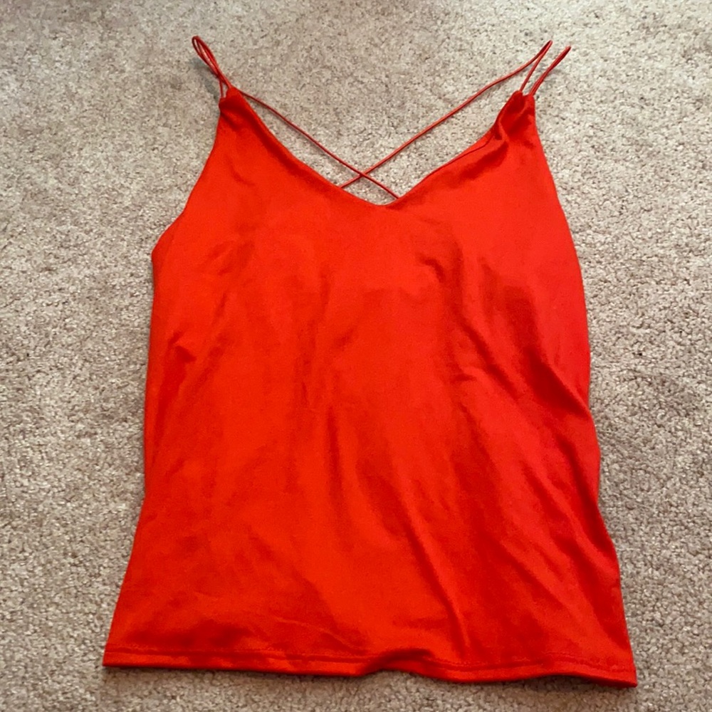 45. Red tank top with cross cross back